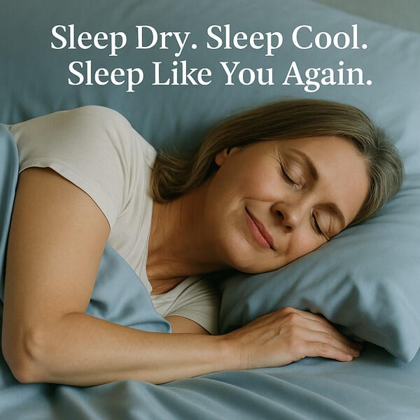 Woman sleeping peacefully on cooling DreamCool™ sheets
