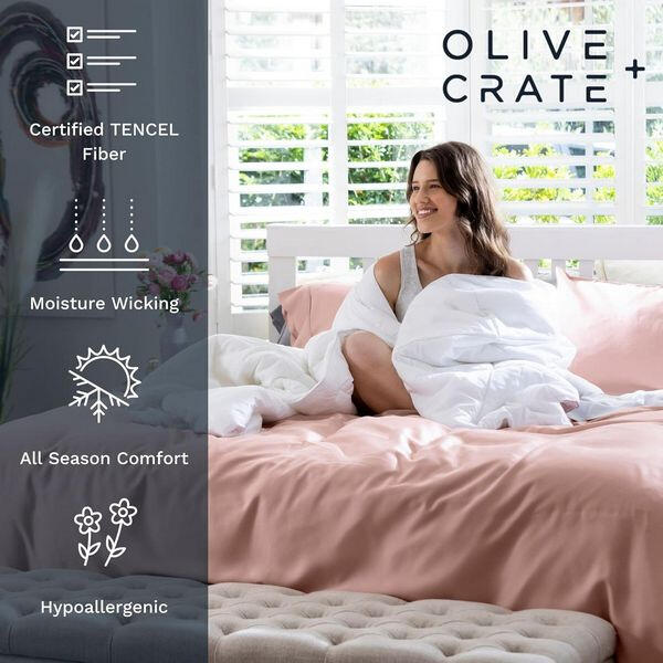 Woman relaxing on bed with DreamCool™ sheets by Olive + Crate, highlighting certified TENCEL™, moisture-wicking, and all-season comfort features